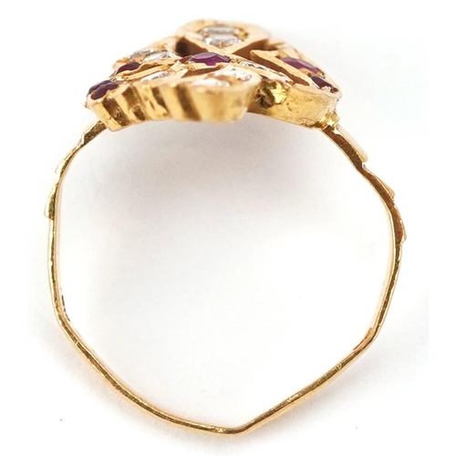 3059 - A 22ct gold ruby and clear stone cocktail ring marked 916, size M, 3.6g.