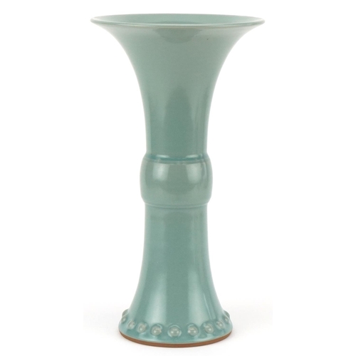 496 - A 20th Century Chinese celadon glazed porcelain trumpet vase, with flared rim and circular base, 35c... 