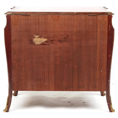 2137 - A 20th century Louis XV style kingwood and gilt metal mounted chest of drawers opens up to a cocktai... 