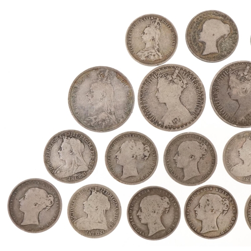 1240 - A quantity of Victorian silver coins to include shillings, florins and a sixpence, one florin dated ... 