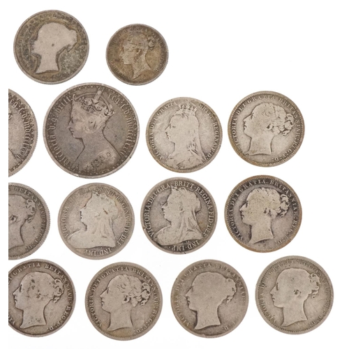 1240 - A quantity of Victorian silver coins to include shillings, florins and a sixpence, one florin dated ... 