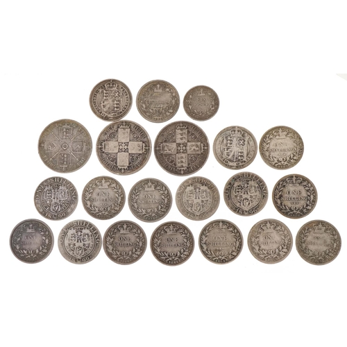 1240 - A quantity of Victorian silver coins to include shillings, florins and a sixpence, one florin dated ... 