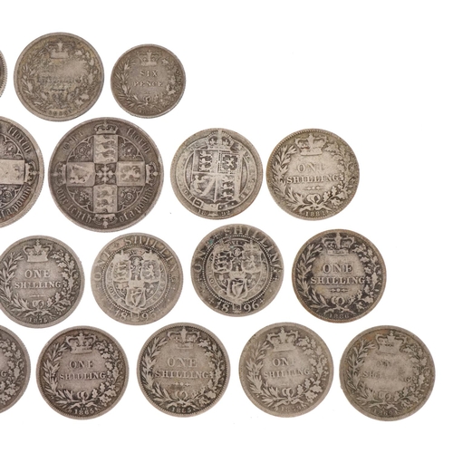 1240 - A quantity of Victorian silver coins to include shillings, florins and a sixpence, one florin dated ... 