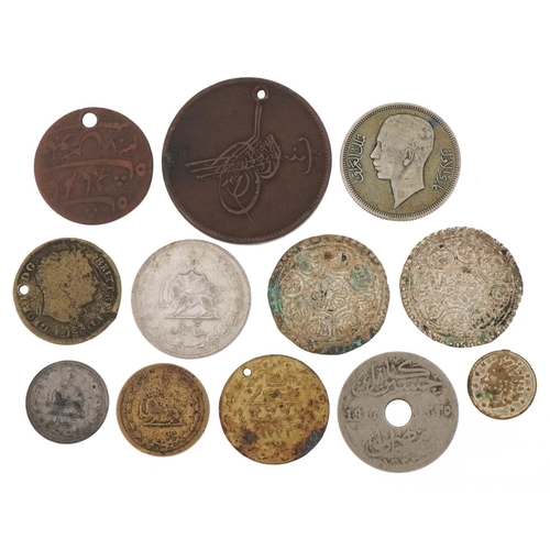 1251 - 19th century and later coins, some silver, to include two silver Tibetan Tangka, an Iraqi 1938 silve... 