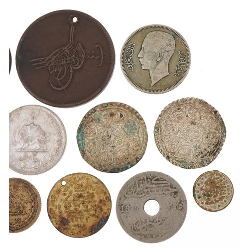 1251 - 19th century and later coins, some silver, to include two silver Tibetan Tangka, an Iraqi 1938 silve... 