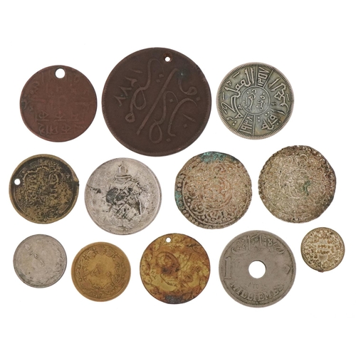 1251 - 19th century and later coins, some silver, to include two silver Tibetan Tangka, an Iraqi 1938 silve... 