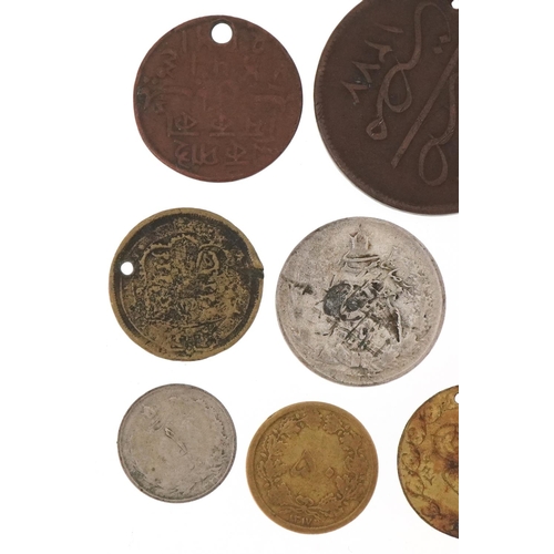 1251 - 19th century and later coins, some silver, to include two silver Tibetan Tangka, an Iraqi 1938 silve... 