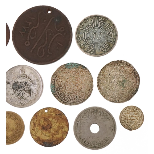 1251 - 19th century and later coins, some silver, to include two silver Tibetan Tangka, an Iraqi 1938 silve... 