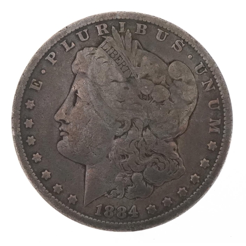 1237 - An 1884 Morgan silver dollar, no mint mark therefore Philadelphia mint.