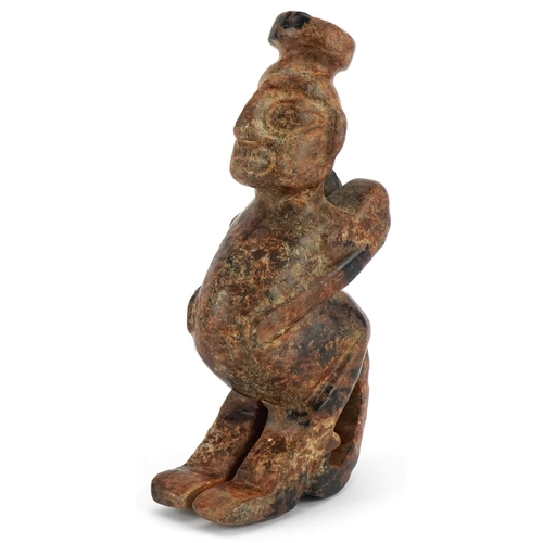 251 - A Chinese carved hardstone figure of a winged deity, 20th century, 18cm high.