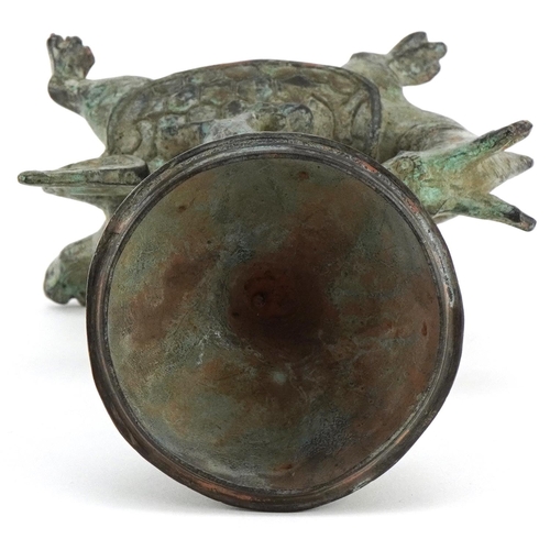 155 - A Chinese verdigris metal figural incense burner, 20th century, modelled as a boy on the back of a d... 