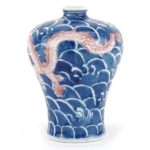 373 - A Chinese blue and white porcelain vase, mark of Kangxi but probably later, decorated with a dragon,... 