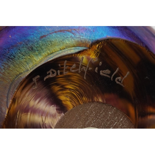 49 - A Glasform iridescent abstract glass paperweight designed by J. Ditchfield, etched signature to base... 