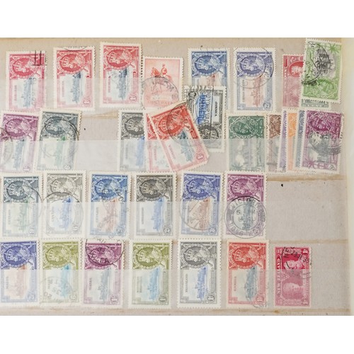 1332 - A quantity of 19th century and later British and world stamps to include sixty three British present... 