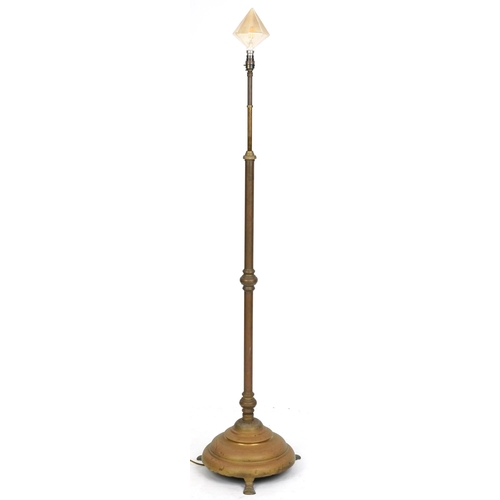 2122 - An early 20th century Arts & Crafts brass telescopic lamp standard on a circular plinth base and tri... 