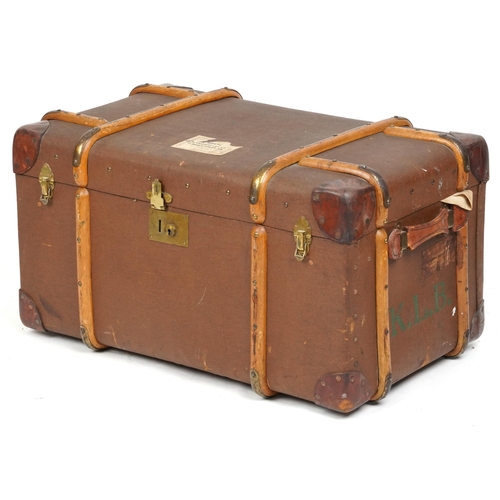 2031 - An early 20th century canvas and leather bound travelling trunk belonging to Robert Kelly Stoker Pet... 