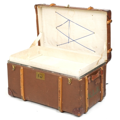 2031 - An early 20th century canvas and leather bound travelling trunk belonging to Robert Kelly Stoker Pet... 