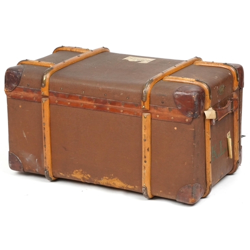 2031 - An early 20th century canvas and leather bound travelling trunk belonging to Robert Kelly Stoker Pet... 