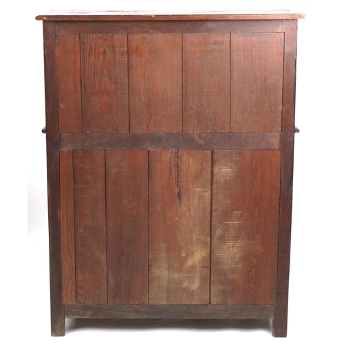 2154 - A 20th century Jacobean Revival oak court cupboard with carved decoration, fitted with two drawers a... 