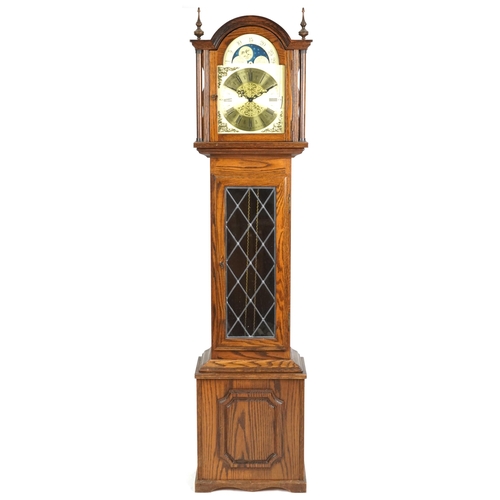 2124 - A late 20th century oak cased longcase clock, 198cm high.