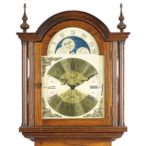 2124 - A late 20th century oak cased longcase clock, 198cm high.