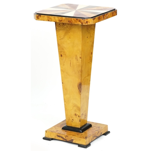 2030 - A modern Art Deco style maple veneered pedestal, with specimen wood veneered top raised on a square ... 