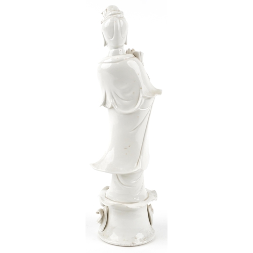 148 - A Chinese porcelain blanc de chine figure of Guanyin, 42cm high.