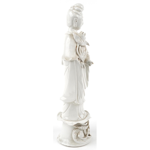 148 - A Chinese porcelain blanc de chine figure of Guanyin, 42cm high.