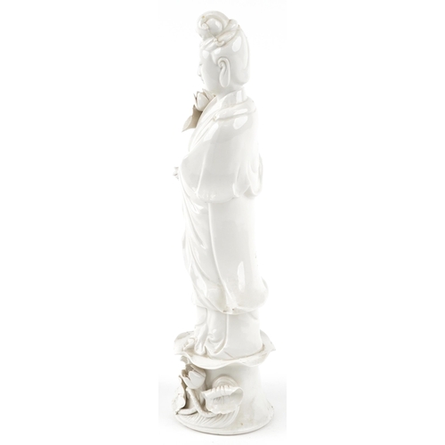 148 - A Chinese porcelain blanc de chine figure of Guanyin, 42cm high.