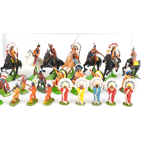 1103 - A collection of vintage and later Britains hand painted metal and plastic cowboy and Indian figures ... 