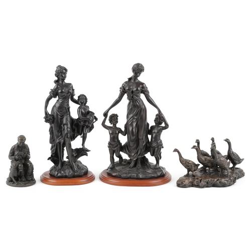 483 - Four decorative bronzed figures including mothers with children and a group of geese, the largest 34... 