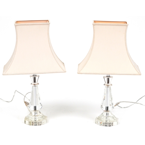 2150 - A pair of perspex table lamps with cloth shades, H-59cm.