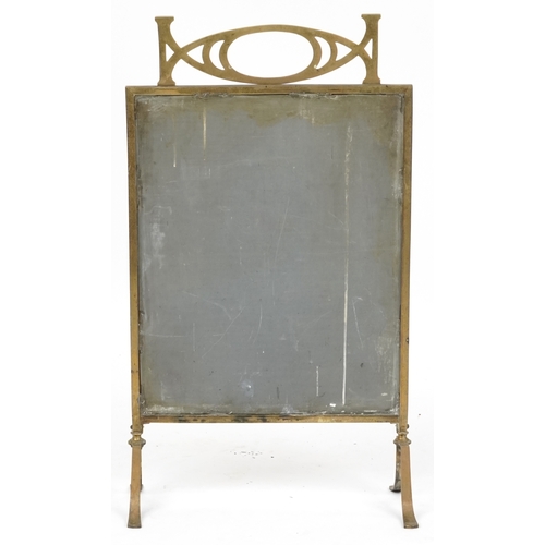 2107 - An early 20th gilt metal framed firescreen with hand painted floral mirror, H-75cm.