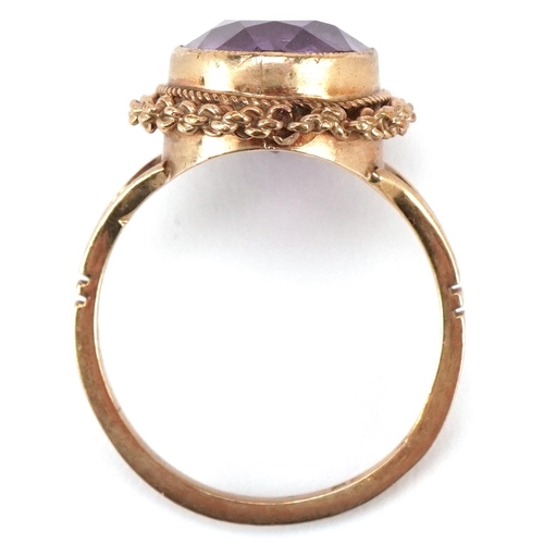 3049 - A 9ct gold amethyst solitaire ring, size N, 3.8g.