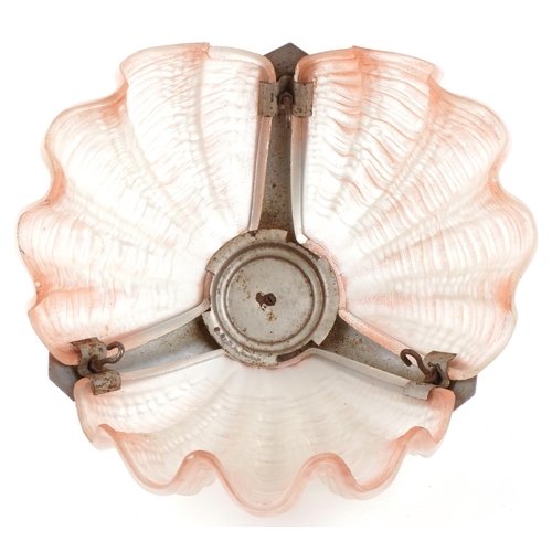 415 - An Art Deco frosted and pink glass shell design light fitting with chromed mounts, 33cm in diameter.