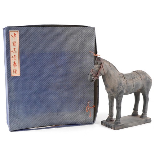 536 - A large Chinese Tang style pottery horse, 33cm high.