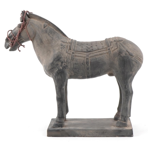 536 - A large Chinese Tang style pottery horse, 33cm high.