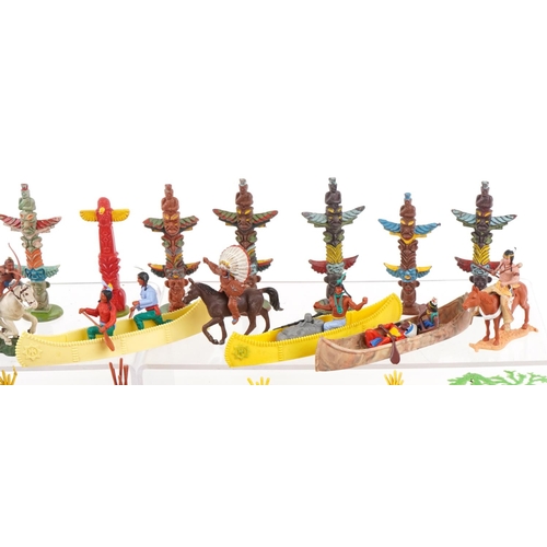 1102 - A collection of vintage Britains hand painted metal and plastic cowboy and Indian figures and access... 