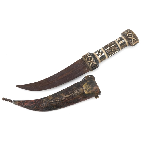 129 - An antique Syrian jambiya dagger and scabbard with mother of pearl and bone inlaid handle, 32cm in l... 