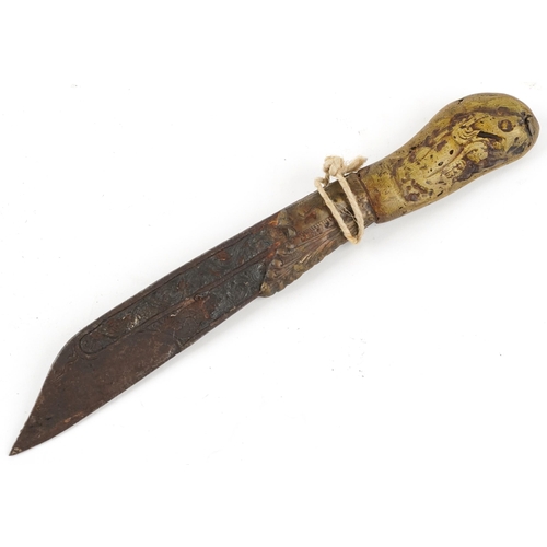 128 - A Middle Eastern steel bladed dagger, late 19th century, the blade with engraved decoration and reco... 