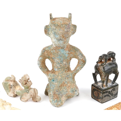 465 - A mixed group of Chinese items, all 20th century, including a russet jade decorative dagger, a simil... 