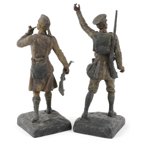 1493 - S. Kinsburger - A pair of mid 20th century spelter models of soldiers, each signed to base, 35cm hig... 