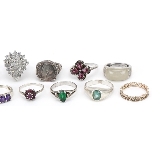 3719 - Thirteen vintage and later silver and white metal rings, some set with semi precious stones, various... 