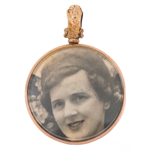 3028 - An Edwardian 9ct rose gold open locket, Birmingham 1915, 4.3cm high, 6.0g.