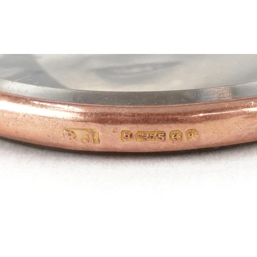 3028 - An Edwardian 9ct rose gold open locket, Birmingham 1915, 4.3cm high, 6.0g.