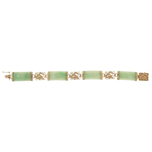 3034 - A Chinese 14ct gold and green jade panel bracelet, 17cm in length, 15.5g.