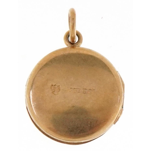 3437 - A 9ct gold floral engraved locket, 1.7cm high, 2.0g.