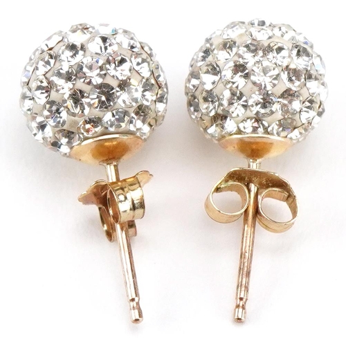 3137 - A pair of 9ct gold crystal ball design stud earrings, 7.5mm in diameter, total 1.0g.