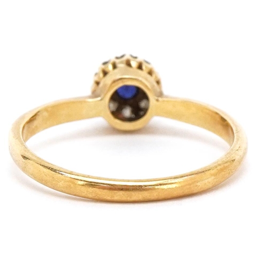 3044 - An 18ct gold sapphire and diamond cluster ring, the cluster 6.70mm in diameter, size O, 3.1g.