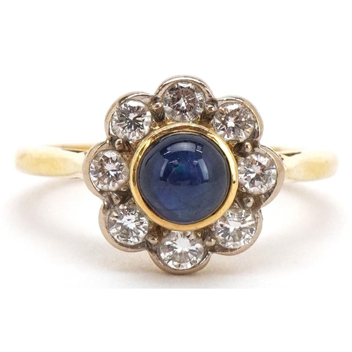 3011 - An 18ct gold cabochon sapphire and diamond flower head ring, each diamond approximately 2.20mm in di... 